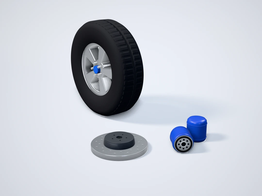 Wheel and tyre, a drilled brake disc and oil filters: automotive spare parts