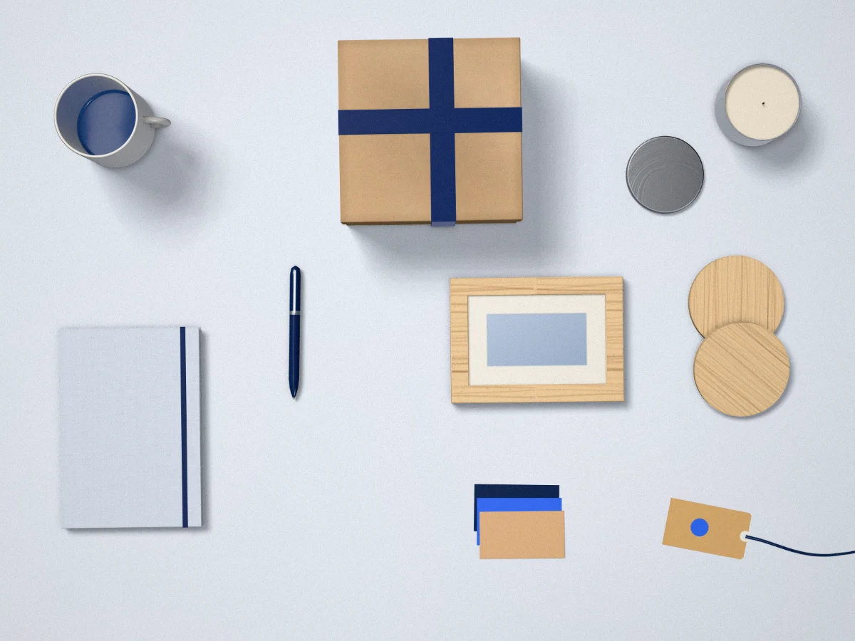 Kraft gift box, ceramic mug, candle and beech frame on a sample table